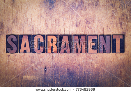 stock-photo-the-word-sacrament-concept-and-theme-written-in-vintage-wooden-letterpress-type-on-a-grunge-776482969